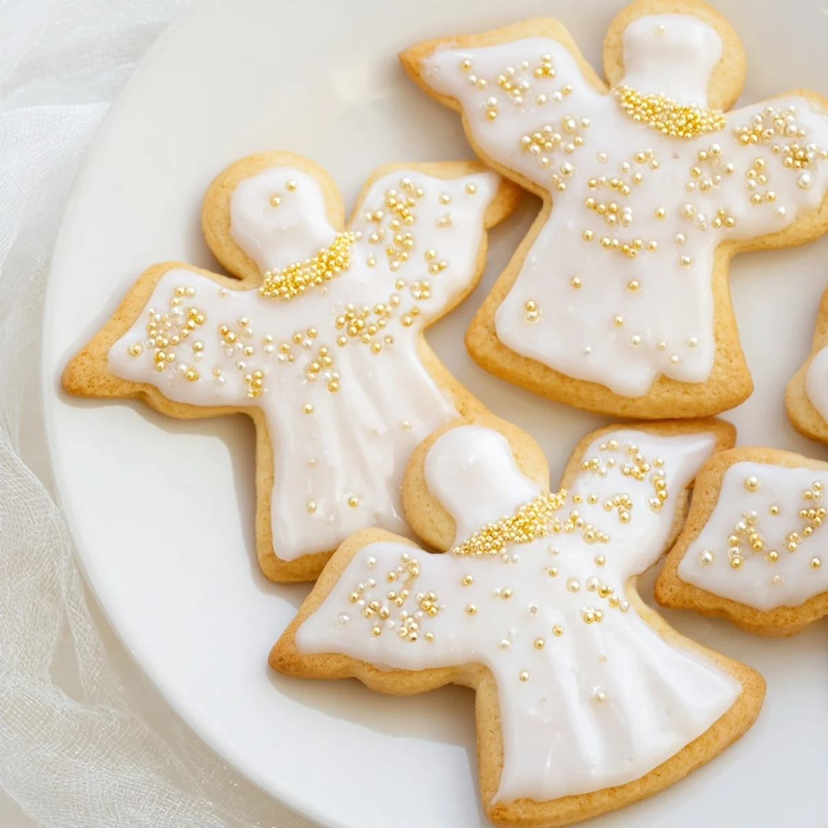 Buttery Biscuits Anges de Noël, delicate angel cookies, perfectly decorated for Christmas gifting and holiday cheer.