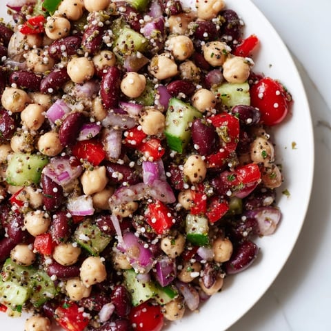 Colorful bowl of Dense Bean Salad with Wellness Seeds, ready for a healthy and satisfying meal.