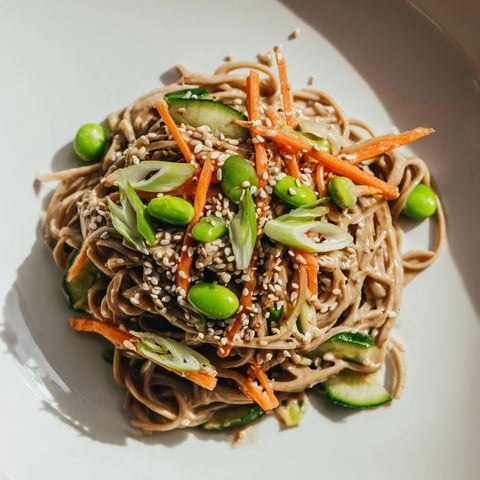 Asian Sesame Noodle Salad with vibrant veggies, ready to serve, a flavorful and refreshing vegetarian meal.