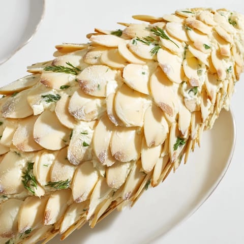 Schneebedeckter Tannenzapfen Dip