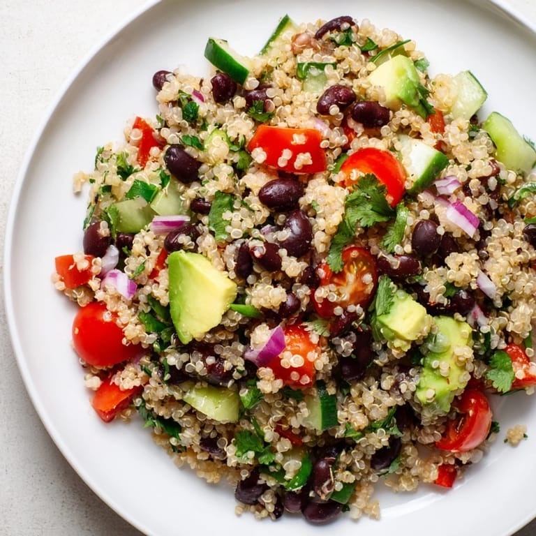 Vibrant Quinoa Black Bean Salad, a colorful mix of fresh ingredients, ready to eat!